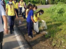 picking polythene bags and garbage  